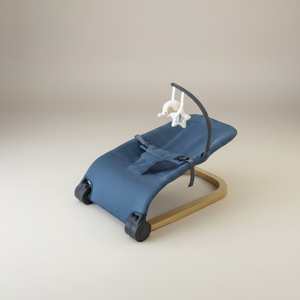 Momviacare blue fabric baby bouncer seat with wooden frame and toy bar, featuring a baby lying comfortably.