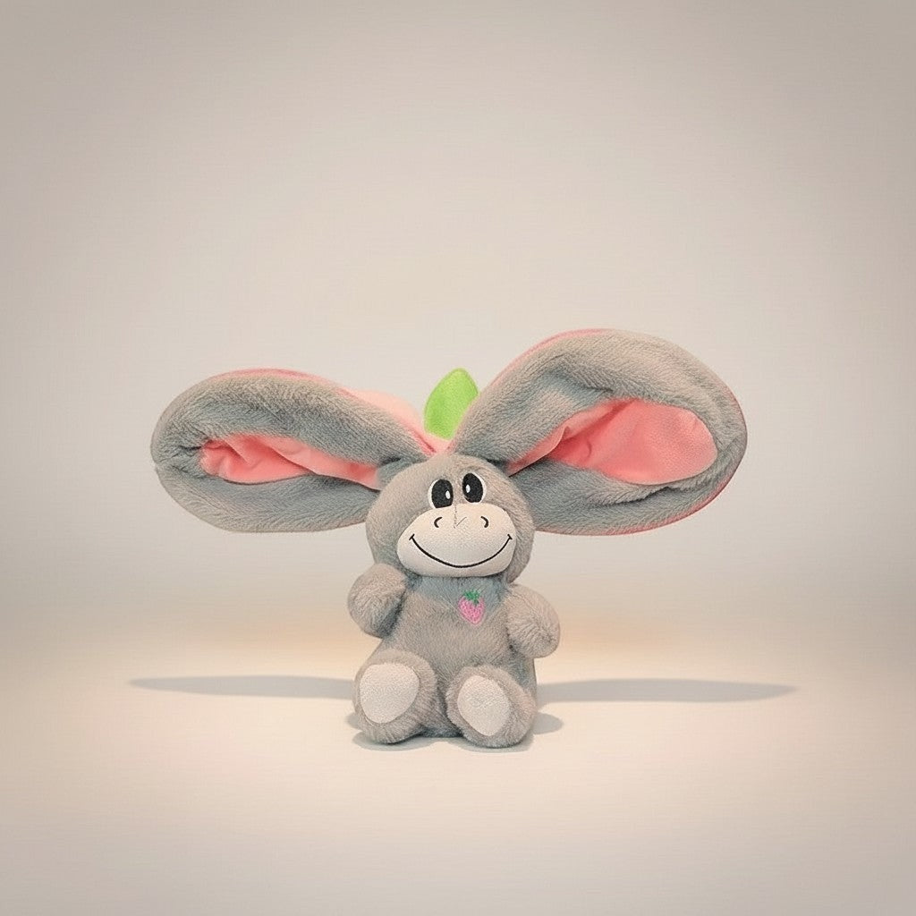 Momviacare grey plush toy with large pink-lined ears, embroidered face, and strawberry detail.