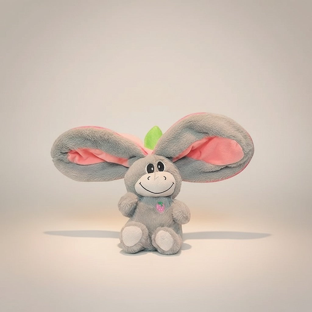 Momviacare grey plush toy with large pink-lined ears, embroidered face, and strawberry detail.