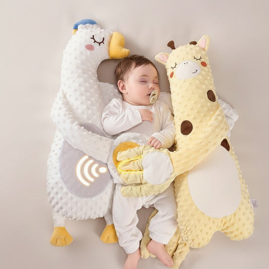 Momviacare plush goose and giraffe baby comfort pillows with a sleeping baby and remote control.